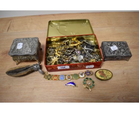 Two white metal and continental trinket boxes, and a tin of miscellaneous costume jewellery, including rings, an enamelled Pa