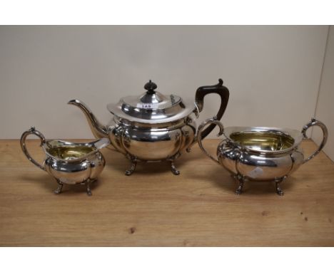 A three piece silver plated tea service, comprising teapot, sucrier and milk jug