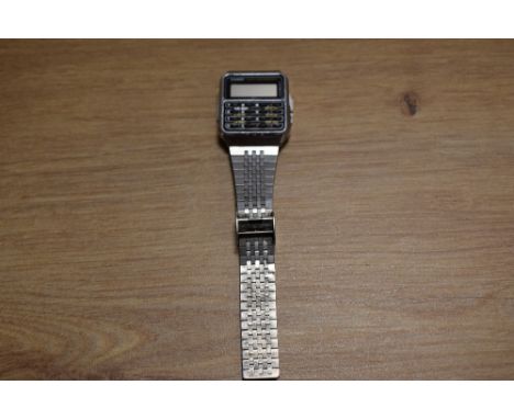 A vintage Casio alarm chronograph wristwatch with stainless steel strap