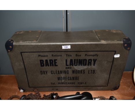 A vintage cardboard laundry or dry cleaning box, marked for Bare Laundry in Morecambe