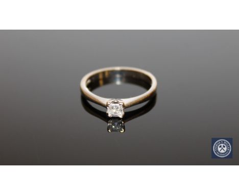 An 18ct gold princess cut solitaire diamond ring, approximately 0.25ct, size L.