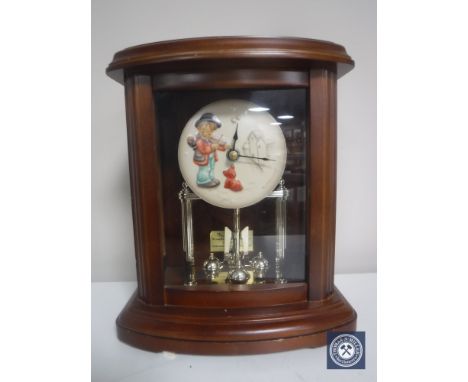A Hummel 70th Anniversary commemorative clock entitled "Puppy Love" 