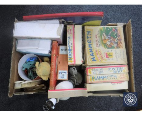 A box of vintage jigsaws, marble table lamp and shade, Teddy bear with glass eyes etc 