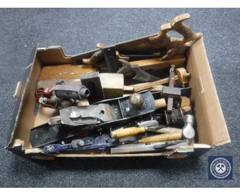 A box of 20th century wood working tools : hand saws, Stanley and other planes, chisels etc and a Monitor brass lamp 
