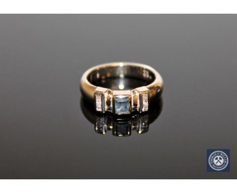 A 14ct white gold diamond and sapphire ring, approximately 0.12ct, size J.