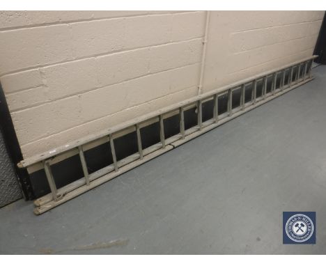 An aluminium extension ladder