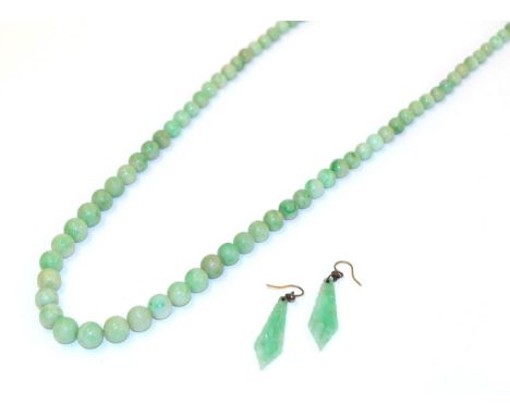 A jade bead necklace, formed of one hundred and fifteen graduated spherical jade beads, length 73cm; together with a pair of 
