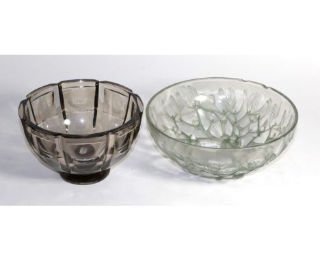 A Lalique mistletoe bowl (a.f.) with moulded mark 'R Lalique', together with an Orrefors charcoal coloured glass bowl (2) 