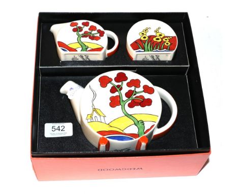 A boxed Wedgwood 'Bizarre by Clarice Cliff' Bonjour teaset