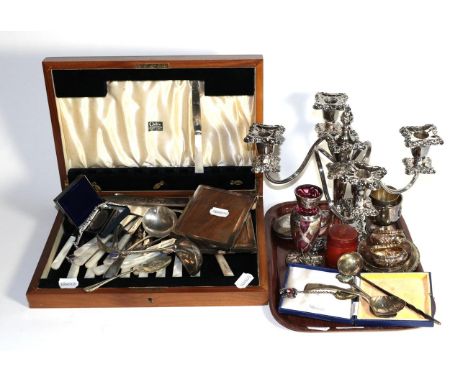Silver and plate including a heavily chased silver spoon, a small toddy ladle, a pair of salts, photograph frames, etc 