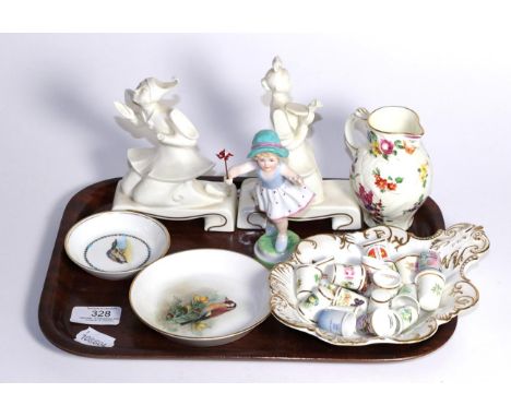 A group of Royal Worcester ceramics including; a dish painted with a Goldfinch signed W. Powell, Sundays Girl figure, The Gre