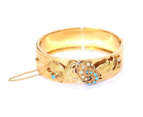 A turquosie and split pearl hinged bangle, the central section engraved and overlaid with a scroll motif set throughout with 