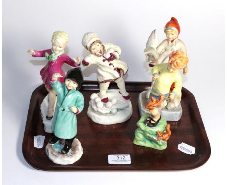 Five Royal Worcester months of the year figures comprising; January, February, October, November and December (tallest 19cm h
