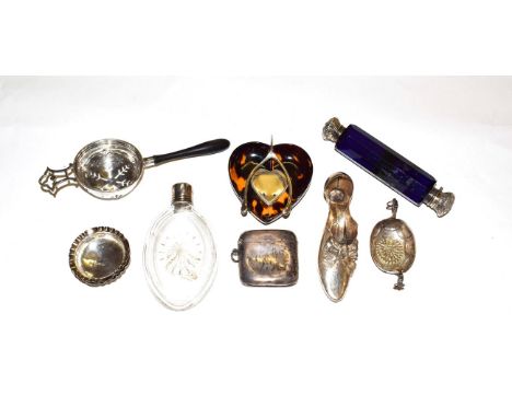 A collection of assorted silver and objects, including: a blue glass double-ended scent-bottle; a tortoiseshell heart-shaped 