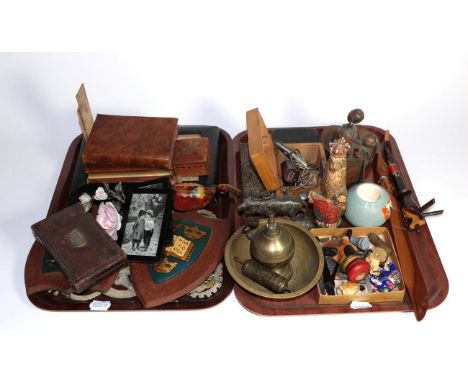 A group of various items including framed French bank notes, book form book ends, shield form plaques, middle eastern brass p