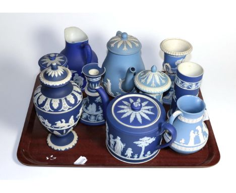 A group of Wedgwood, Adams and other blue Jasper ware including teapots, jugs, urns etc.  candle stick with large chip to top