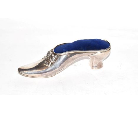 A Victorian silver pin cushion, by Charles Boyton, London, 1894, modelled as a ladies shoe, 16.5cm long