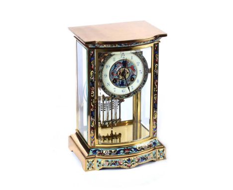 BRASS & ENAMEL MANTEL CLOCK WITH A CIRCULAR DIAL OF 4 INCHES & FOUR GLASS PANEL SIDES ON A SHAPED FOOT BASE.R.CO PARIS. HEIGH
