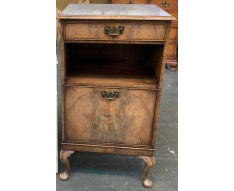 A walnut veneer cabinet, with single drawer, over open shelf and purdonium style cupboard, on cabriole legs, 92x41x51cmH 