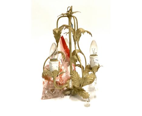 A wrought metal acanthus ceiling light with glass drops 