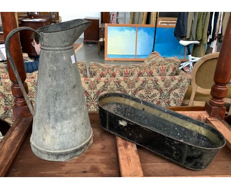 A tin water jug; together with a small enamelled tin trough planter, 44cmW 