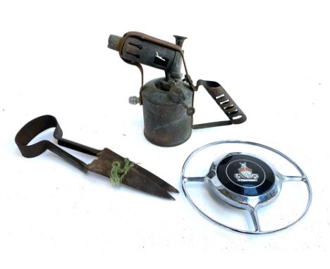 A pair of sheep shears, a Bladon paraffin blow lamp,  a Rover steering wheel centre plate 