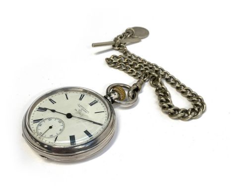 A silver open faced pocket watch by S Smith &amp; Son, 'The Charing', the white enamel dial with Roman Numerals and outer min