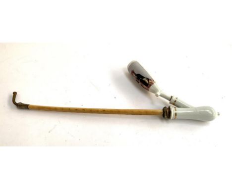 A 19th century continental porcelain smoking pipe, the hand painted bowl depicting a lady, the mouthpiece mounted in white me