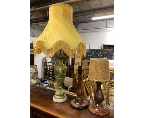 Two turned wooden table lamp; together with one other gilt table lamp with twin handles and shade, 77cmH 