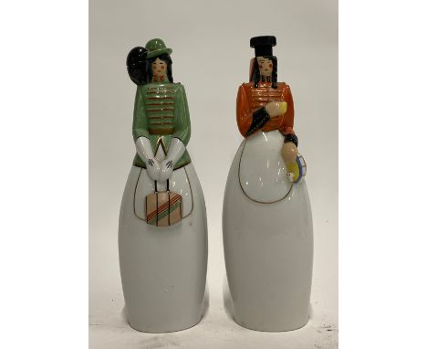 Two Roby Paris ceramic bottles each in the form of ladies in formal dress, each approx. 30cmH, one without original stopper (