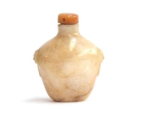 A Chinese white and russet jade snuff bottle, flattened ovoid form and carved mask handles, with hardstone stopper and ivory 