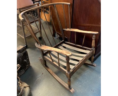 An Ercol stickback rocking chair 
