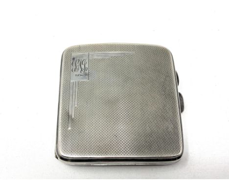 A silver cigarette case with engine turned decoration  CONDITION REPORT: 97g 