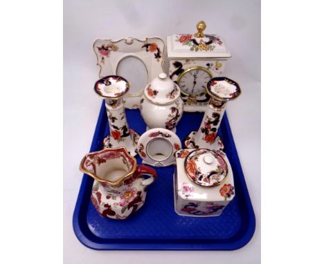 A tray containing seven pieces of Masons Mandalay china to include mantel clock, candlesticks, photo frames, together with a 