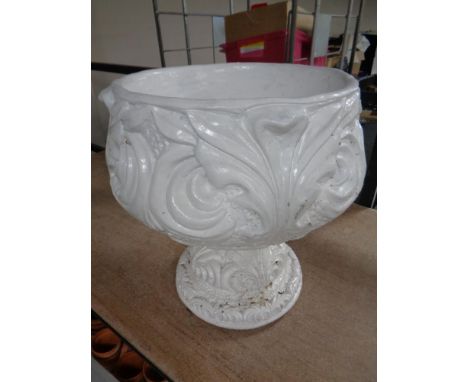 A painted concrete garden planter (white)