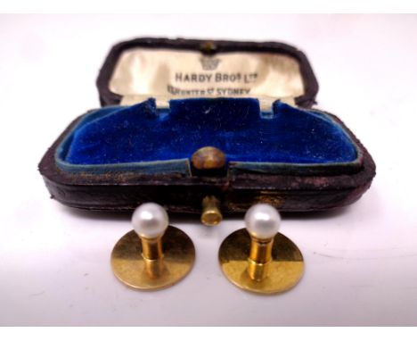 A pair of 15ct gold cultured pearl dress studs 