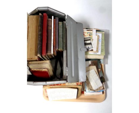 A metal concertina tool box containing assorted books together with a quantity of paper ephemera to include German banknotes,