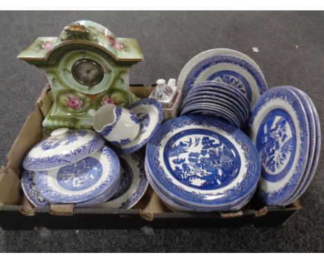 A box of late 19th century china mantel clock and a large quantity of willow pattern dinner ware 