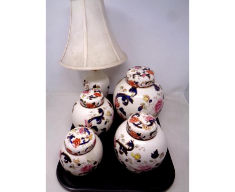 A tray containing four Masons Mandalay ginger jars together with a matching table lamp with shade