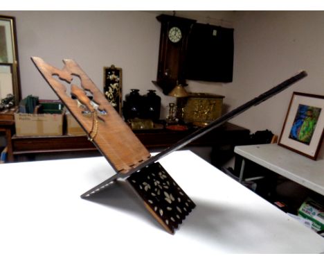 A 19th century Syrian folding X-framed Quran stand with mother of pearl inlay