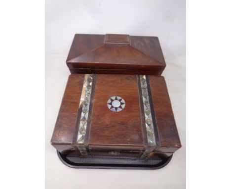 A tray containing a Victorian mahogany sarcophagus tea caddy together with a further Victorian rosewood mother of pearl inlai
