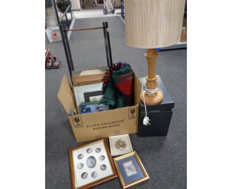 A box containing assorted pictures and prints, folding stand, woolen travel rug, LED torch together with a file box and a woo