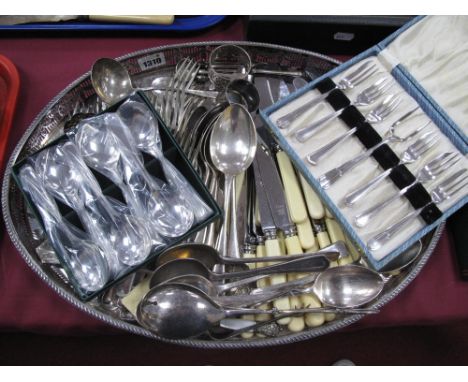 Silver Hallmarked Ladle, London, plated cutlery, on an oval shaped engraved tray.