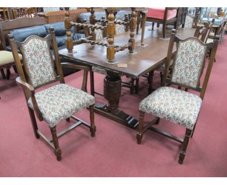 A Large Oak Refectory Table, with rectangular top, on heavy cup and cover carved supports, 240 cm wide; A Set of Eight Matchi