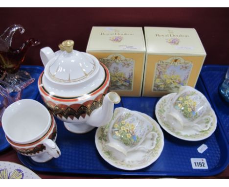 Doulton 'Brambly Hedge' Spring Cups &amp; Saucers, in boxes. Cunard QEII three piece tea service.