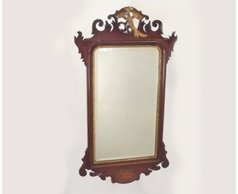 GEORGIAN MIRROR.
A Georgian carved & walnut veneered mirror, with gilt gesso decoration. Height 98cm.
PLEASE NOTE:  Our in-ho
