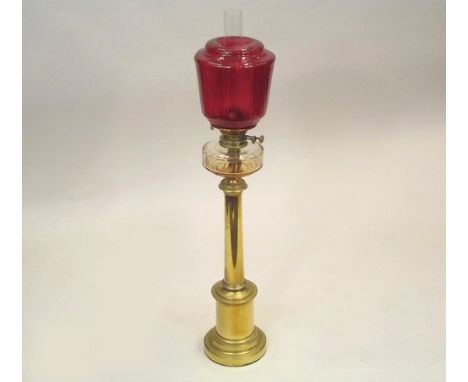 OIL LAMP.
A 19th century tall oil lamp, with clear glass fount & cranberry shade. (Shade damaged) Height 93cm.
PLEASE NOTE:  