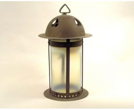 HALL LANTERN.
An Arts & Crafts brass mounted hall lantern, with cylindrical vaseline glass shade. Drop 41cm.
PLEASE NOTE:  Ou