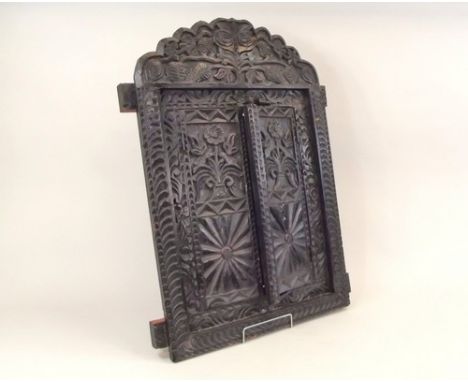 MIRROR.
A wall mirror in carved wooden frame with folding doors. 77 x 57cm.
PLEASE NOTE:  Our in-house, postal shipping servi