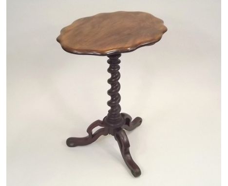 TRIPOD TABLE.
A Victorian mahogany table with spiral column & pierced triform feet. Height 70cm.
PLEASE NOTE:  Our in-house, 